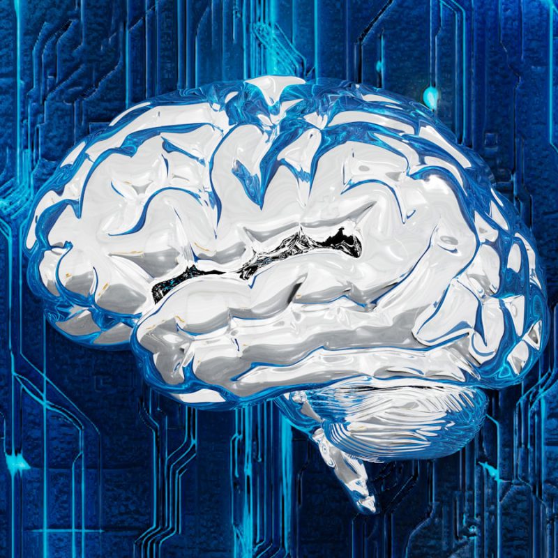 A computer circuit board with a brain on it